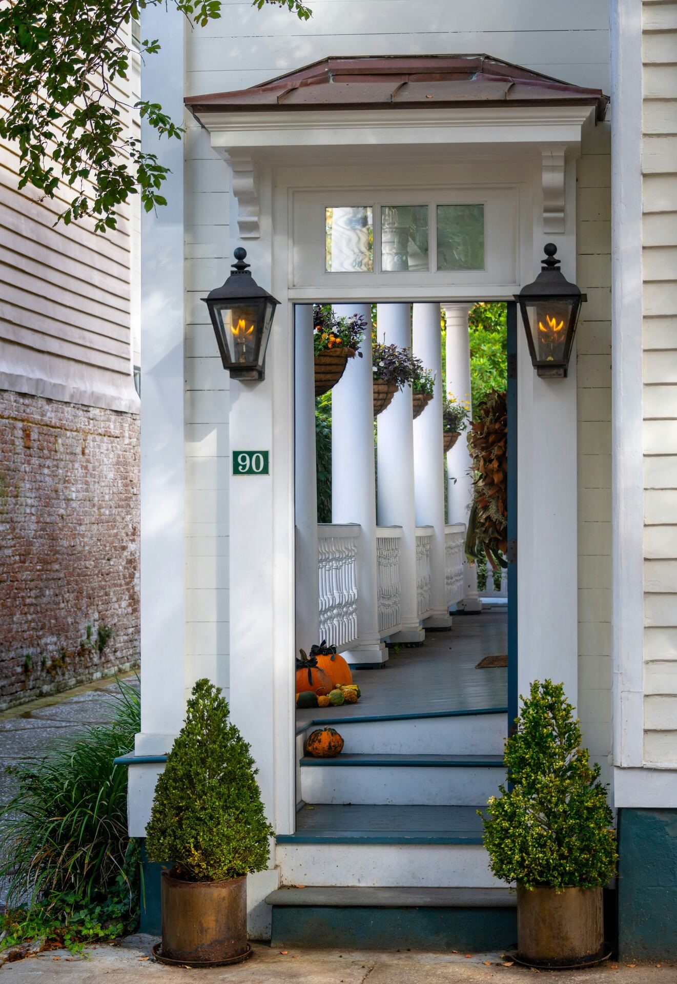 A Charleston piazza with columns and shutters on the peninsula